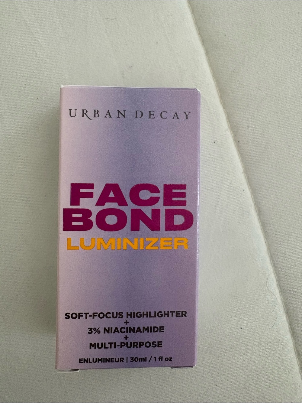 Urban Decay Face Bond Luminizer — Pink and Purple Packaging